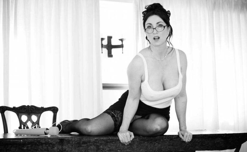 Miss Hybrid in sexy stockings, high heels and glasses playing with her magic Wand.
